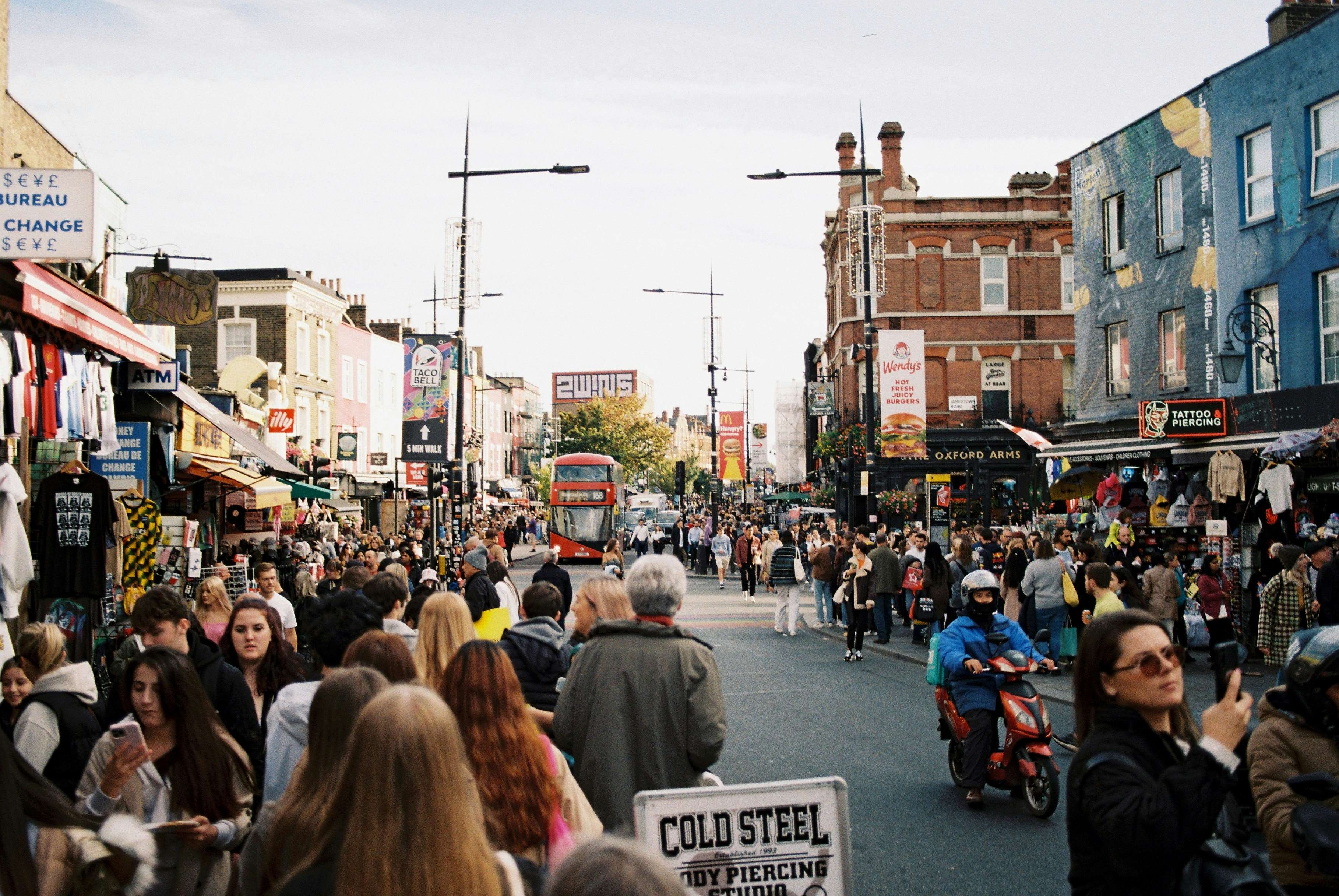 People walking down the street in Camden, London, UK